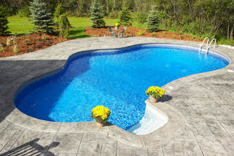 Picture of an in-ground pool installation in Pittsburgh, PA.